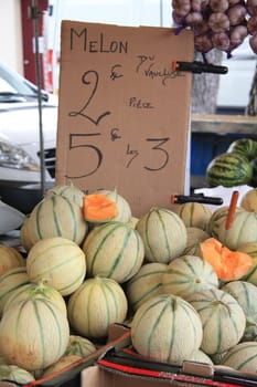 Big fresh melons on a local market