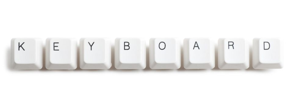 Keyboard word written with computer buttons over white background