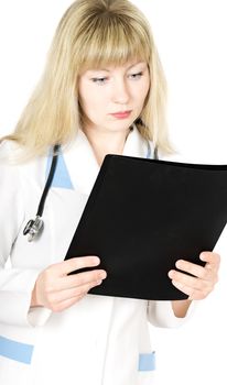 Woman doctor reading  medical history