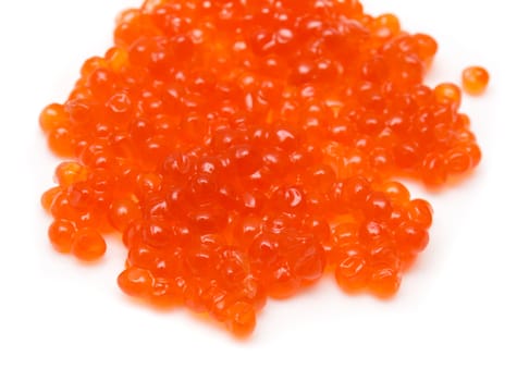 Red salmon caviar heap isolated on white 