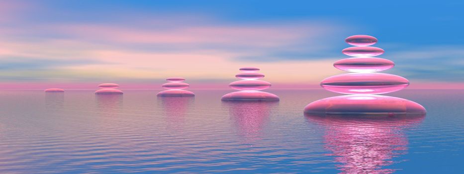 Growing balanced stones upon the ocean in blue and pink background