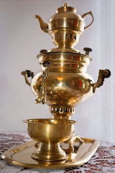 Traditional russian old samovar with selective focus on the front handle