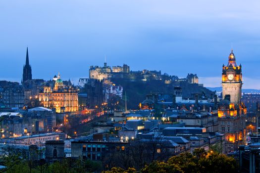 Edinburgh Cityscape and castle from Calton Hill at dusk Scotland UK