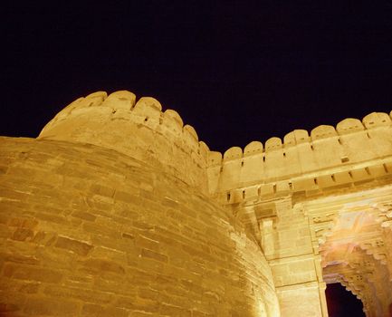 Kumbbhalghar Fort, Rajasthan India - Night scene of bastions and main entrance of Indian heritage and historical significance