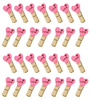 pink heart and clothes pin on white background
