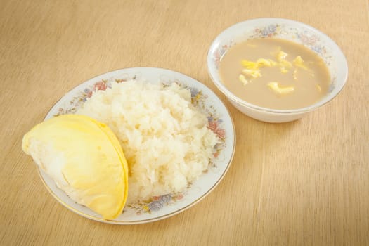 Durian sticky rice on the wood background