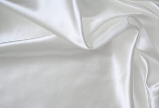 Smooth elegant white silk as wedding background