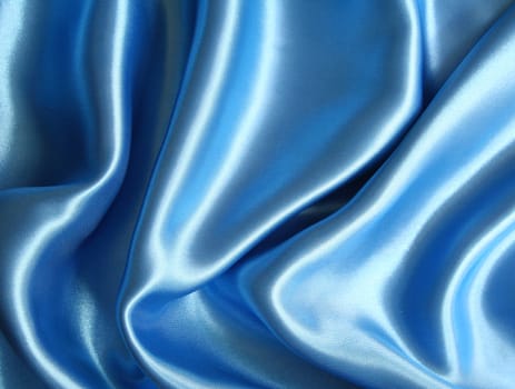 Smooth elegant dark blue silk can use as background 