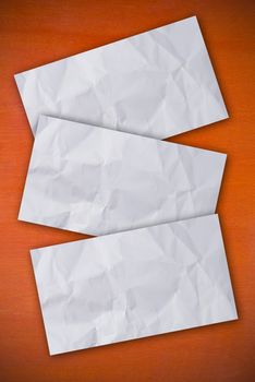 several paper on the wood background