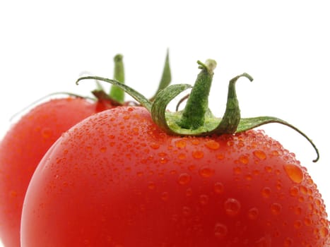 top of two wet tomatoes isolated on white