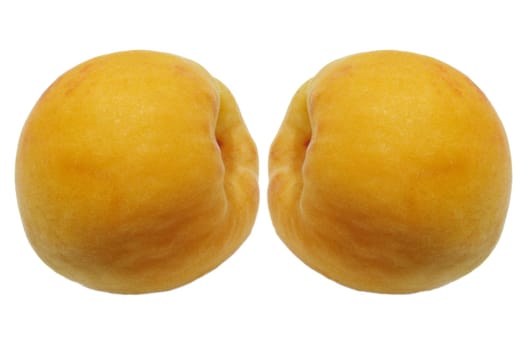 two apricots over white