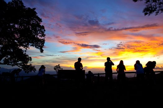 silhouette of photographers on the Mountain