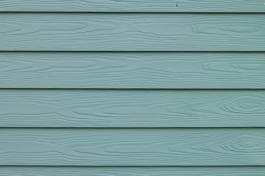 An green painted wall of the house