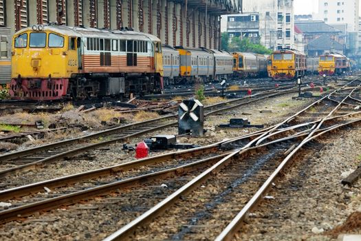 View over freight train station, focus on rails