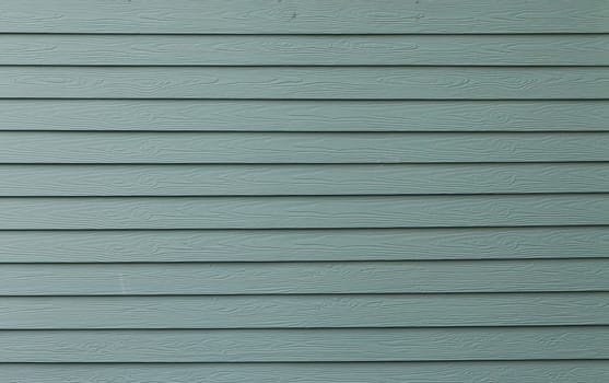 An blue painted wall of the house