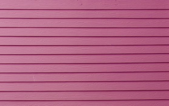 An pink painted wall of the house