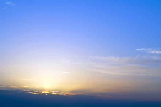 Sky with cirrus clouds in the sunset