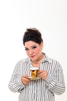 Pretty plus size woman with gold cup of coffee