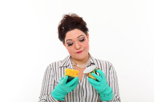 Woman in carrier cleaning a gold mug