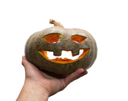 hand holding halloween pumpkin 