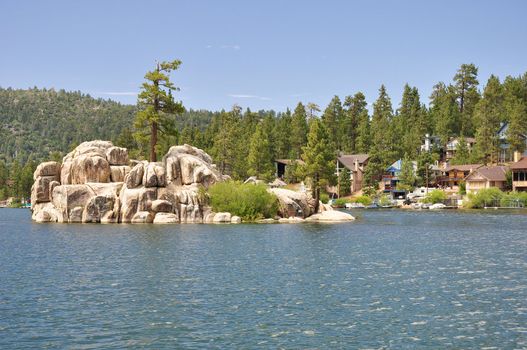 Cabins line the shore around Boulder Bay at Big Bear Lake in Southern California.