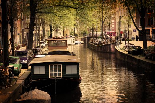 Amsterdam, Holland, Netherlands. Romantic canal, boats. Old town