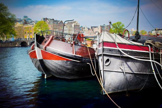 Amsterdam, Holland, Netherlands. Old town canal, boats.