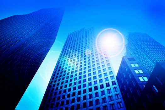 Business skyscraper buildings in blue tone. Office work, big city, finance concepts