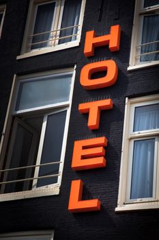 HOTEL sign over the entrance to the building