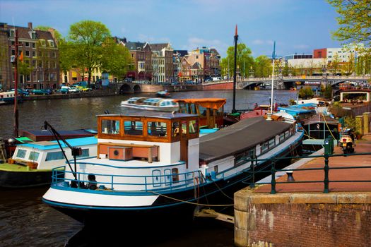 Amsterdam, Holland, Netherlands. Old town canal, boats.