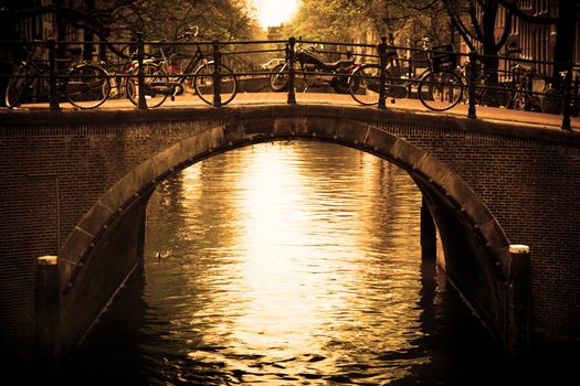 Amsterdam, Holland, Netherlands. Romantic bridge over canal. Old town