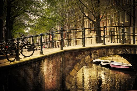 Amsterdam, Holland, Netherlands. Romantic bridge over canal. Old town