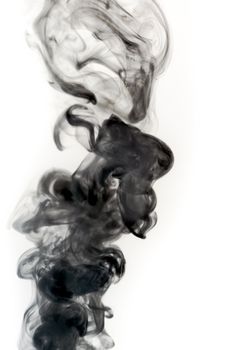 A photograph of black smoke on a white background. 