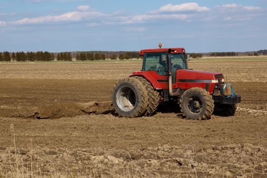 Agriculture.  tractor plowing the fields