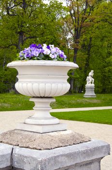 outdoor vase with flowers in the old manor park