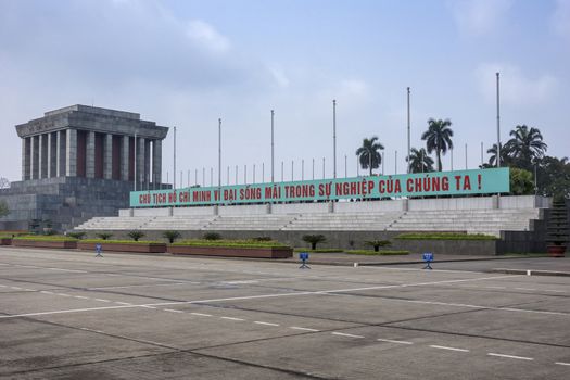 Text says, 'President Ho Chi Minh lives forever in our works!'