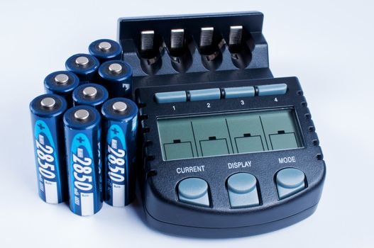 Battery charger with battery on wite background