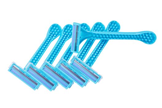 Bunch of blue razors on white background isolated close up