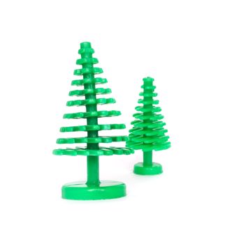 two plastic christmas trees