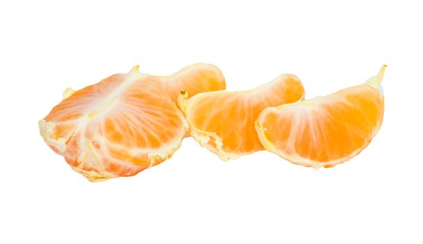 Slices of peeled orange on white background 