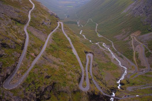 Trollstigen mountain road in Norway river HDR