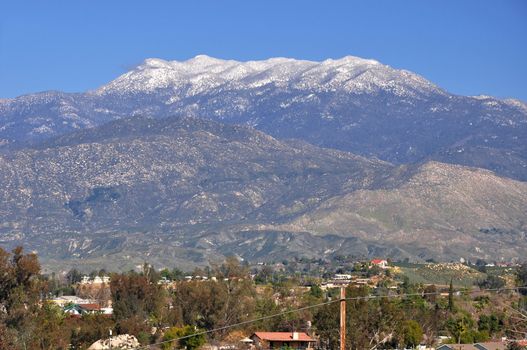 Snow-capped Mount San Jacinto is photographed from the town of Hemet, California.