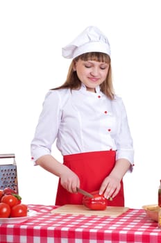 attractive woman cuts vegetables, cooking dinner