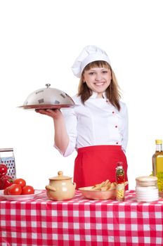 attractive woman holds a large platter with food, white background