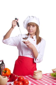 beautiful woman tries to cooked food, cooking vegetables