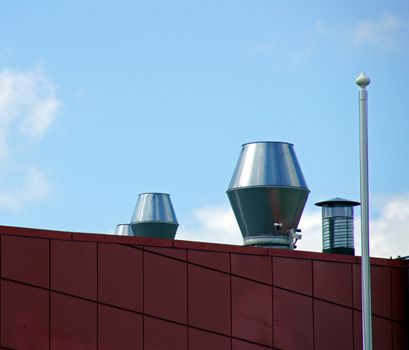  Ventilation on a roof on a background of the blue sky