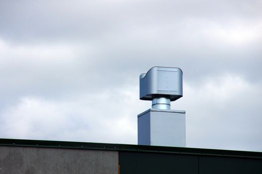Ventilation on a roof and a wall of an industrial building