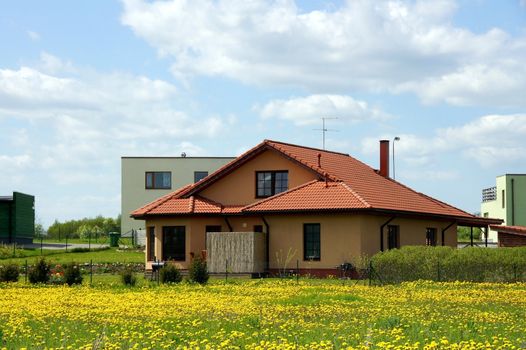 Apartment house on a background of clouds