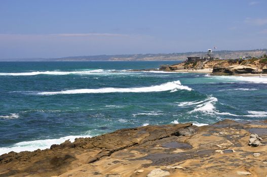View of the rugged and rocky shoreline which fronts La Jolla, California near San Diego.