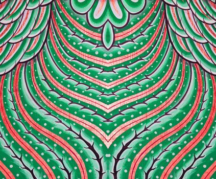 Vintage traditional Thai style art painting on temple for background.